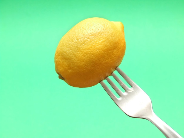 fresh lemon on fork