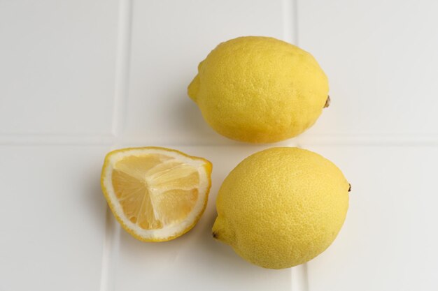 Fresh lemon fruits lemon whole half on the table Selective focus