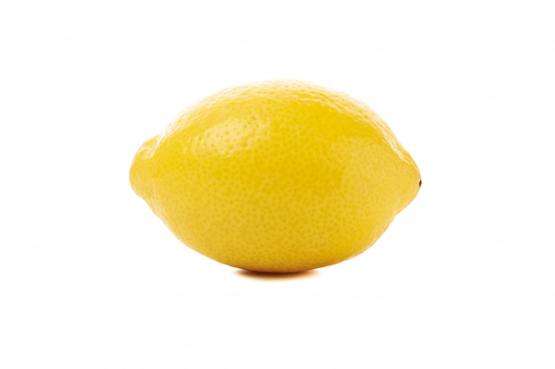 Fresh lemon isolated on white surface. Ripe fruit