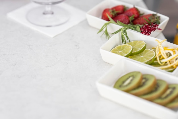 Fresh lemon kiwi and strawberry on the table