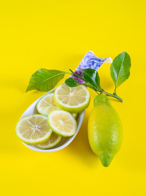 Fresh lemon slices on ceramic spoon typical of Vietri