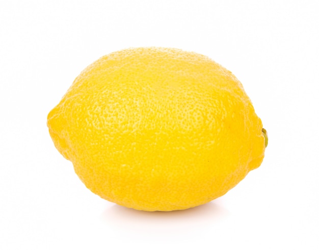 Fresh lemon on white wall