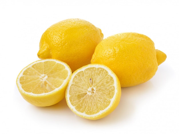 Fresh lemon on a white wall