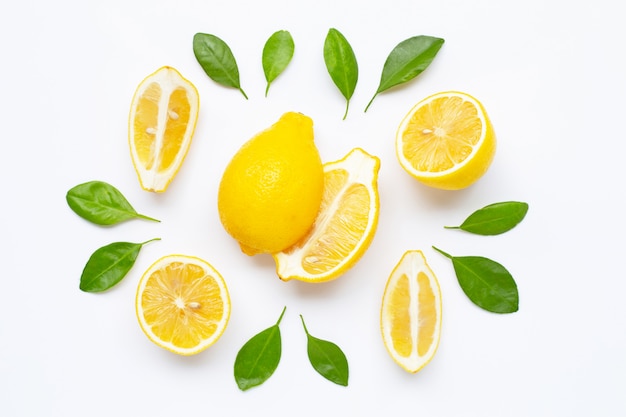 Fresh lemon with leaves isolated on white 