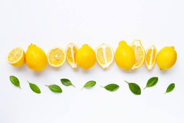 Fresh lemon with leaves isolated on white 