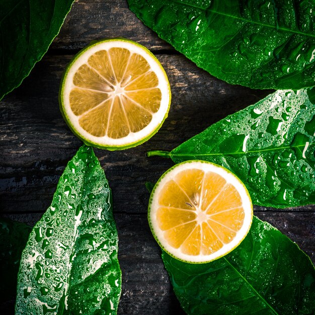 Fresh lemon on wooden background