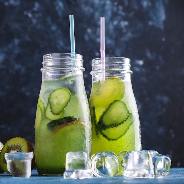 Fresh lemonade  kiwi and cucumber. Refreshment water. Closeup