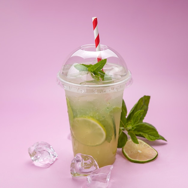 Fresh lemonade with mint in a plastic cup