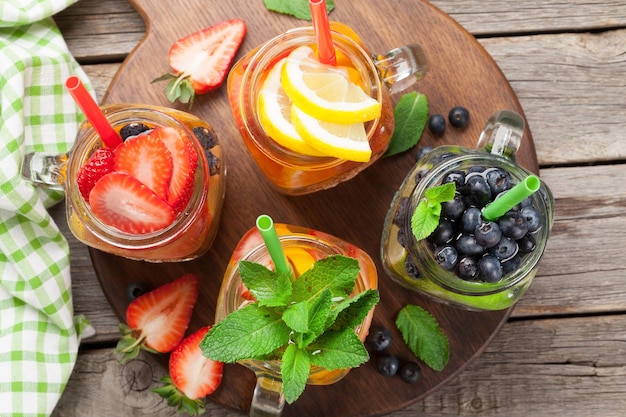 Fresh lemonade with summer fruits and berries