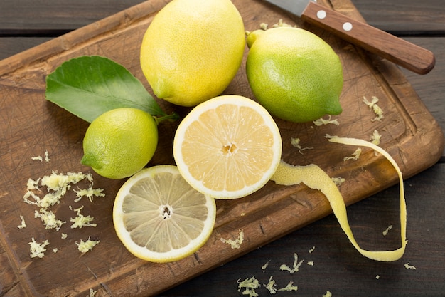 Fresh lemons on cutting board