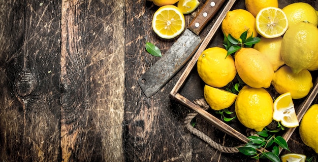 Fresh lemons on an old tray.