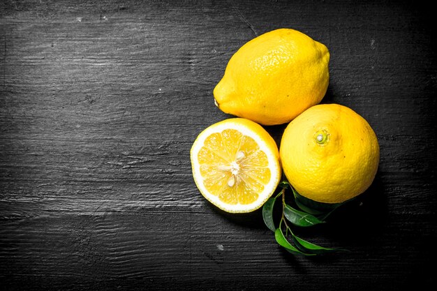 Fresh lemons with leaves.