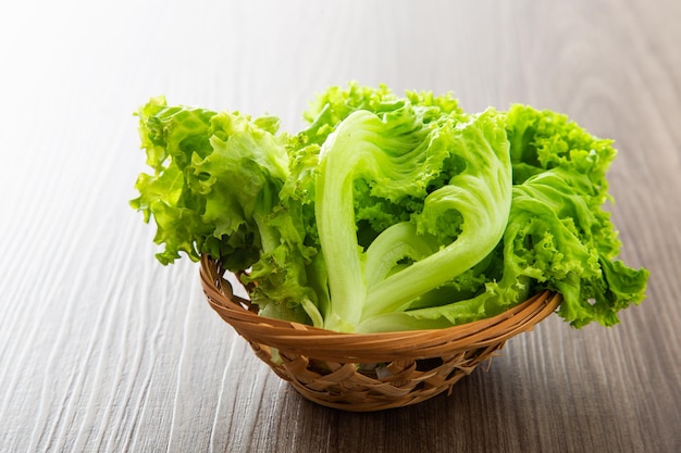 Fresh lettuce vegetable on a wooden table