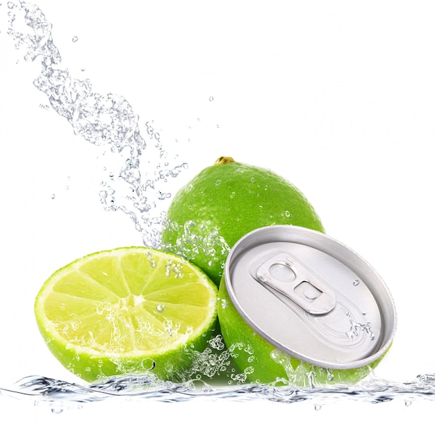 Fresh lime falling in water