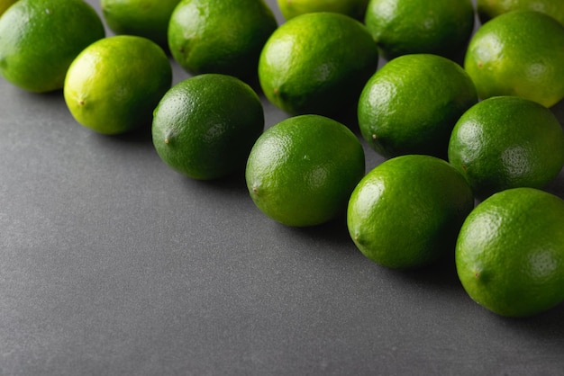 Fresh lime isolated on grey background