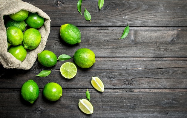 Fresh lime in the sack and pieces of juicy lime