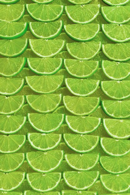 Photo fresh lime slices as a background