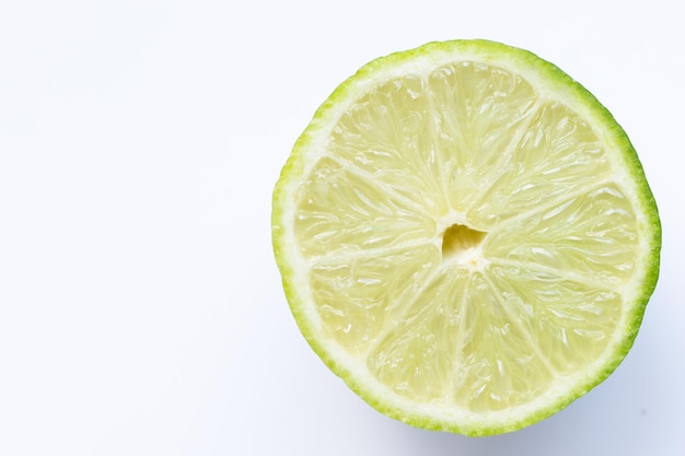 Fresh lime on white background Copy space