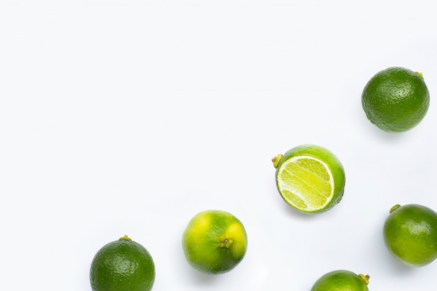 Fresh limes isolated on white