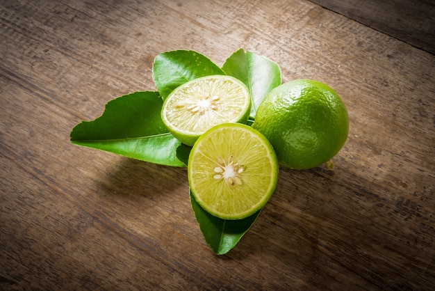 Fresh limes on wooden