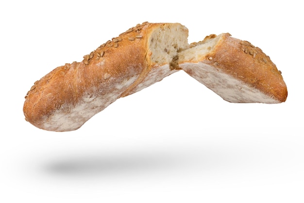 Fresh loaf of light bread on a white isolated background healthy food concept a loaf broken in half