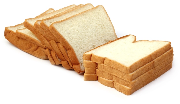 Fresh loaves close up over white background