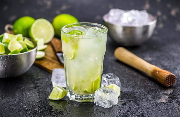 Fresh made Caipirinha on a slate slab closeup shot selective focus