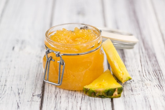 Fresh made Pineapple Jam on a rustic background