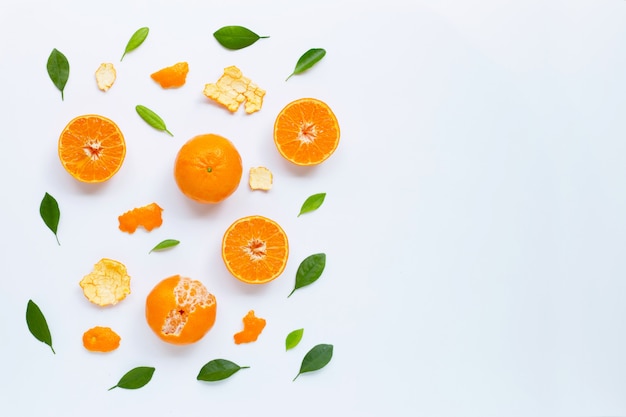 Fresh mandarin orange with leaves on white background