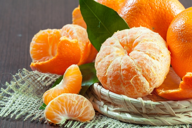 Fresh mandarines on wooden table