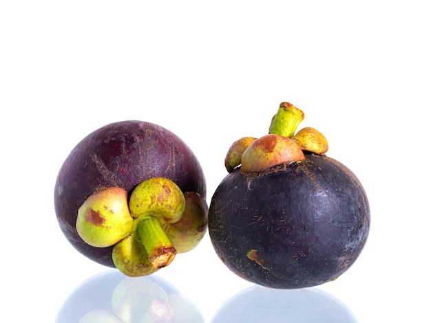 Fresh mangosteen fruit on the white