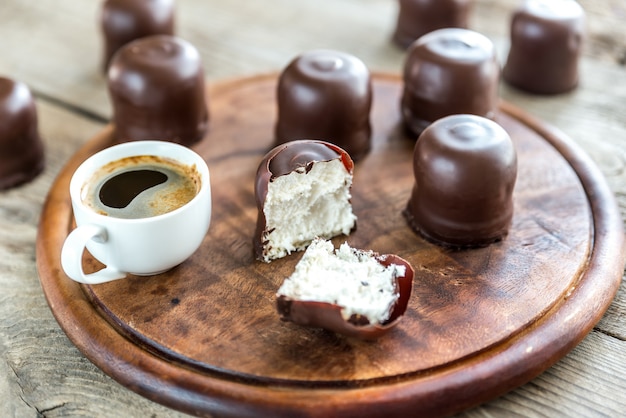 Fresh marshmallows with two cups of coffee