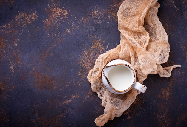 Fresh milk in a jug. Top view