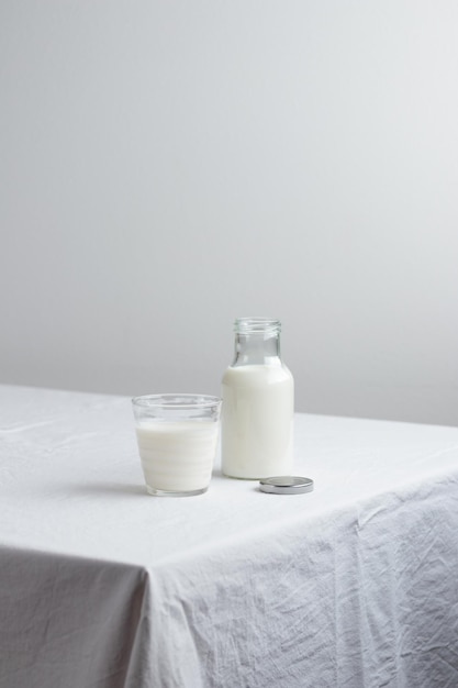 Fresh Milk on the table with white tablecloth