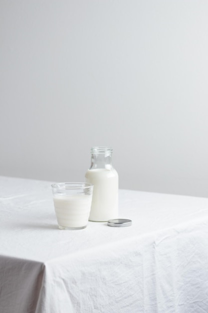 Fresh Milk on the table with white tablecloth