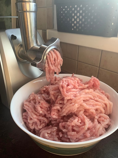 Fresh minced meat from food processor. Studio Photo.