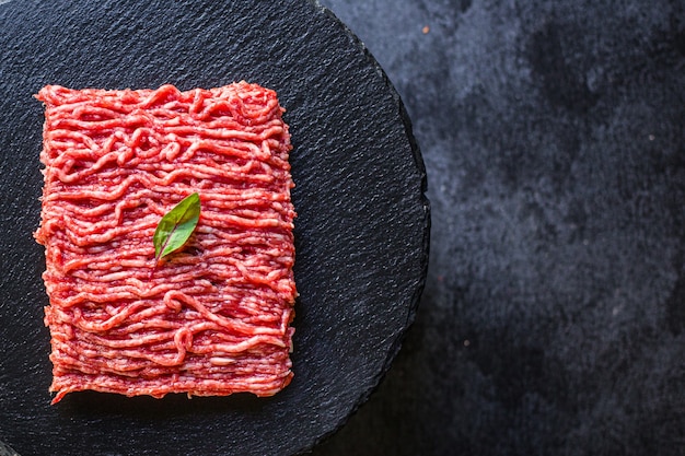 Fresh minced meat grinder meal ingredient on the table