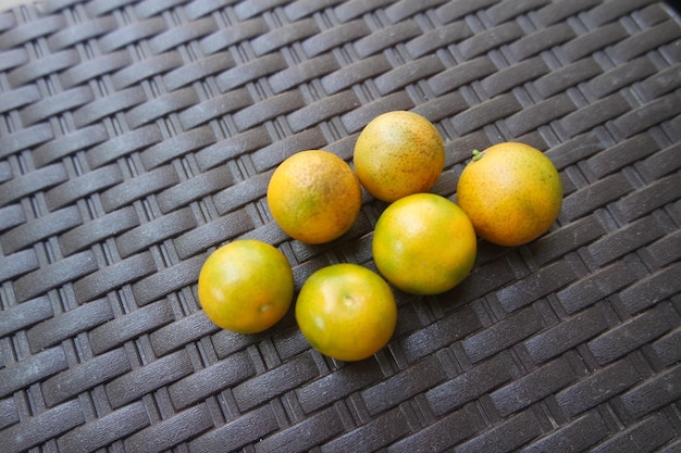 fresh mini orange fruit at the backyard garden in summer time day