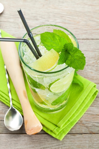 Fresh mojito cocktail and bar utensils