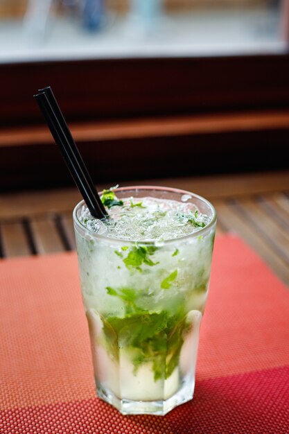 Fresh mojito cocktail on the table in the bar