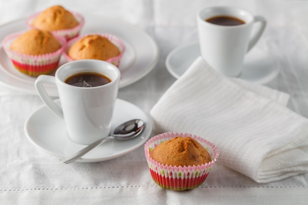 Fresh muffins on the table.