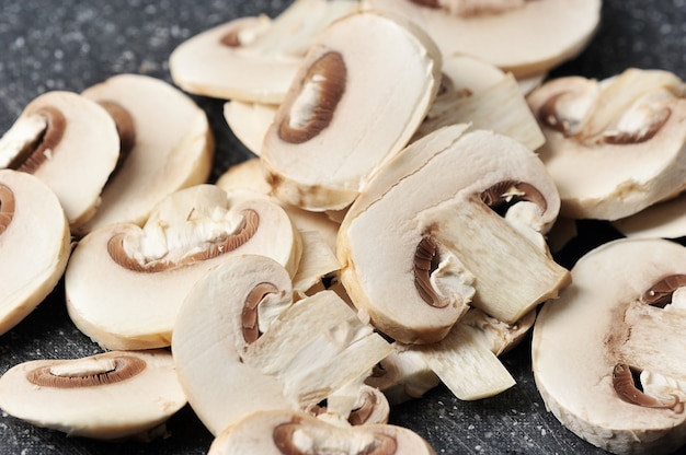 Fresh mushrooms cut into pieces