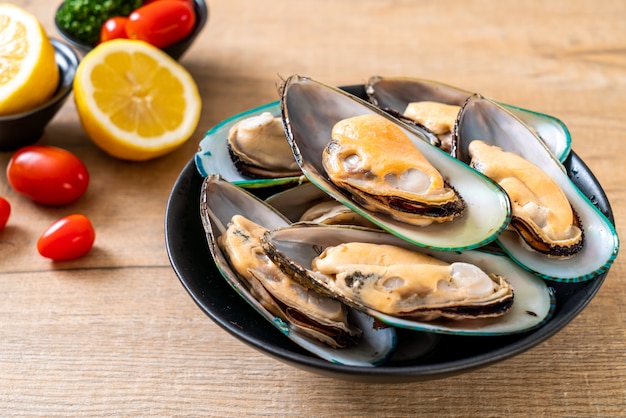 fresh mussel on bowl