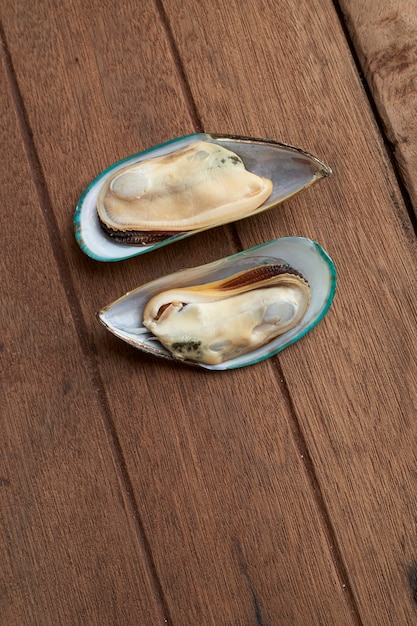 Fresh mussel on wood table 