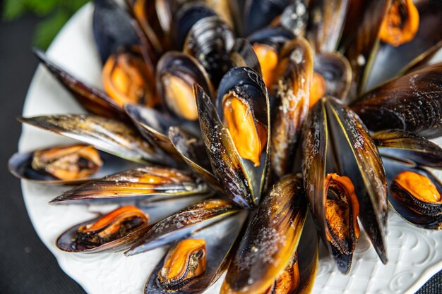 fresh mussels in shells seafood meal on the table copy space food background rustic