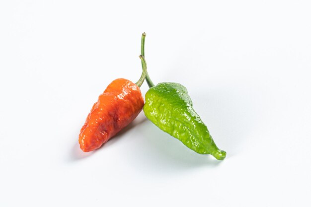 Photo fresh naga chilli isolated on white background