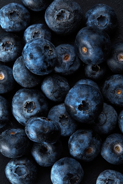 Fresh natural antioxidant blueberries pile, macro detailed close up