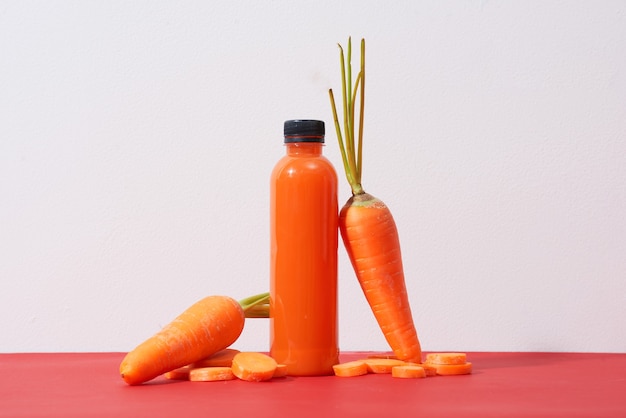 Fresh natural carrot juice on table. Healthy drink.