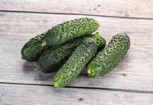 Fresh natural organic few cucumbers heap