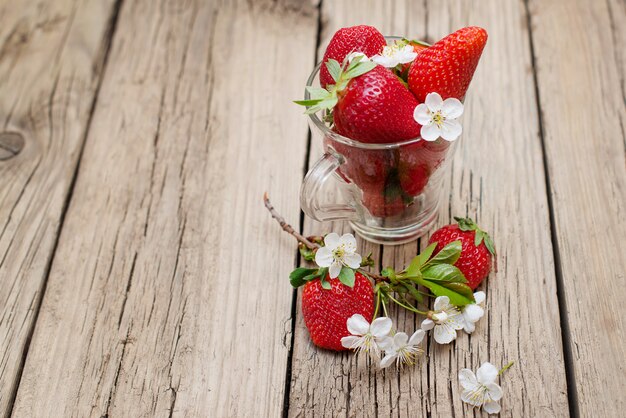 Fresh natural strawberries on a light surface